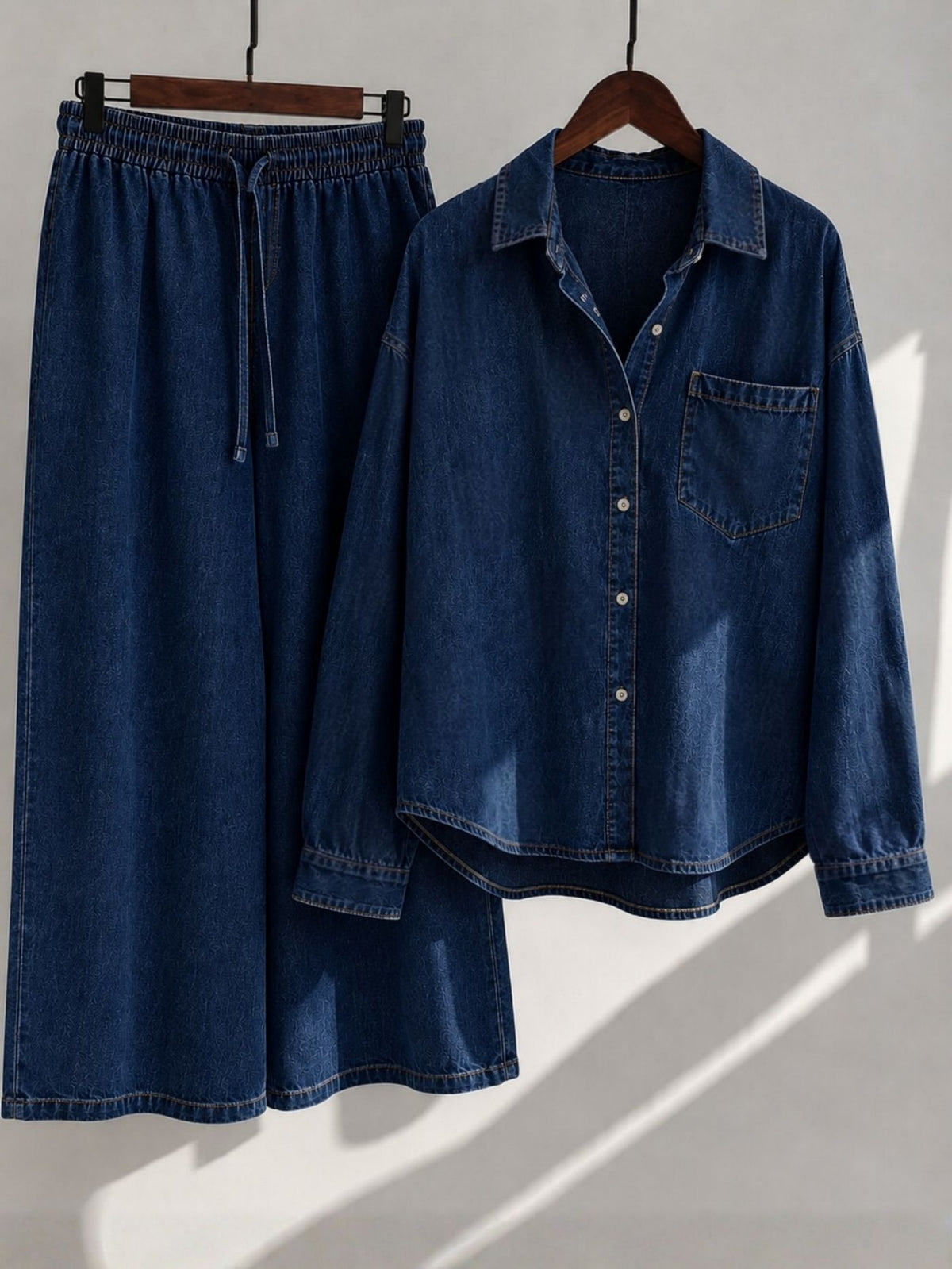Rivelle Muse deep-indigo denim shirt and palazzo co-ord set 
